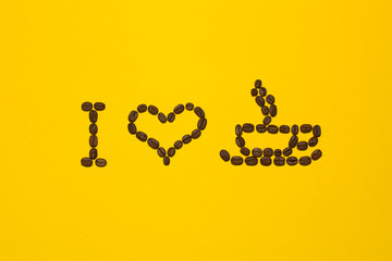 I love Coffee written with brown coffee beans on yellow background