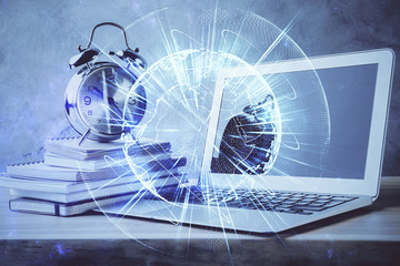 Double exposure of business theme icons and work space with computer background. Concept of success.