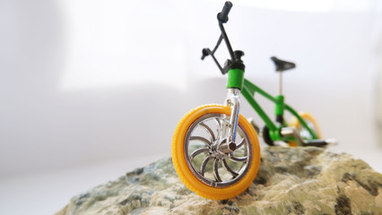 bicycle on a stone, model of a bicycle