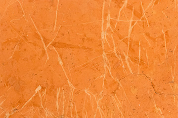 Red, orange and yellow marble texture. Stone background seamless pattern