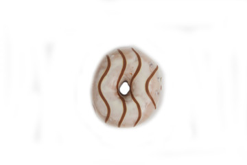 donut decorated with chocolate isolated on light background flat lay