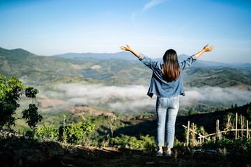 Beautiful asian tourist traveler girl on holiday adventure traveling on the mountains, walking...