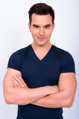 Obraz premium Portrait of young handsome man with arms crossed