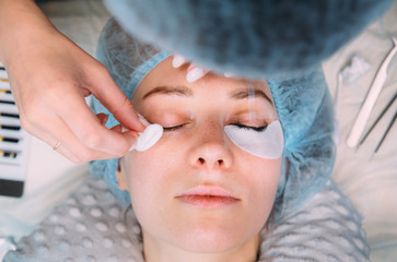 Eyelash Extension Procedure. Woman Eye with Long Eyelashes. Lashes, close up, macro, selective...