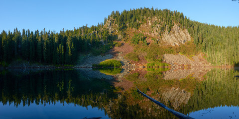Sunny morning panorama at the Blue Lake. Indian Heaven wilderness in Washington state in the USA.