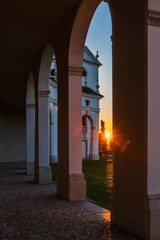 Sunset between the columns. Ancient residence of the Doge of Venice. Udine. Italy