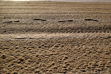 Cullera, Valencia, Spain: 02.08.2018; The footprint design on the beach