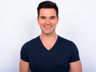 Obraz premium Face of happy young handsome man smiling