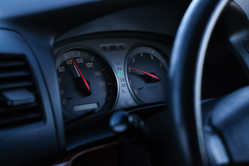 Fototapeta na wymiar Car analog dashboard in a right-hand drive car