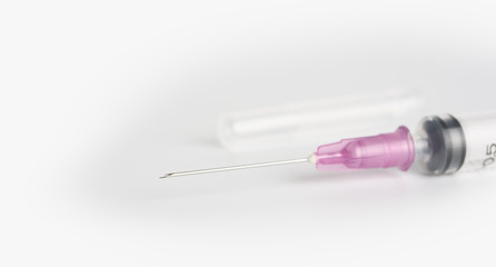close up new syringe on white background