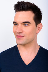 Fototapeta premium Face of young handsome man thinking and looking away