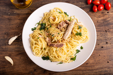  Seafood spaghetti with garlic and parsley. Healthy and nutritious Italian food. Blue fish, omega 3...