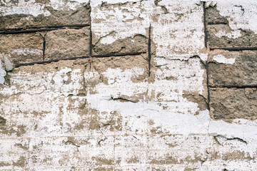 Old and weathered brick and concrete wall. Texture, wallpaper and background concept. own space for text.