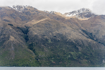 steep slopes of Hector range on Wakatipu lake shore, from near Devils Staircase, Otago, New Zealand