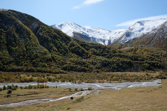 Khaldechala river and Maphkrani Mountain Range in background. During trekking to Khalde glacier. Greater Caucasus, Svaneti, Georgia