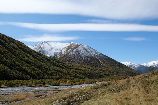 Khaldechala river and Maphkrani Mountain Range in background. During trekking to Khalde glacier. Greater Caucasus, Svaneti, Georgia
