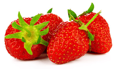 Strawberries with leaves isolated on a white background.