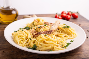  Seafood spaghetti with garlic and parsley. Healthy and nutritious Italian food. Blue fish, omega 3 recipe.