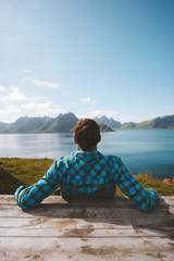 Man enjoying sea view resort travel summer tourism vacation outdoor in Norway healthy lifestyle success wellness concept