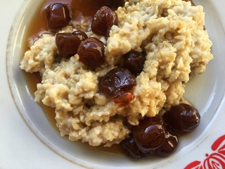 champion breakfast, oatmeal with cherry jam, vitamins