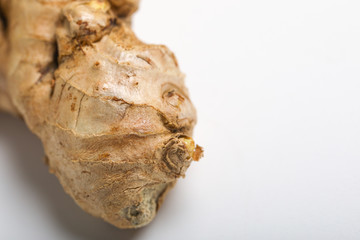 Fresh ginger on white background, herb medical concept