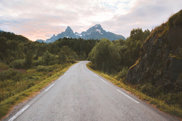 Empty road to the mountains landscape in Norway Travel summer vacations Lofoten islands trip scenic view beautiful destinations