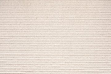 corrugated cardboard for packing. abstract background horizontal lines with wavy lines of beige color