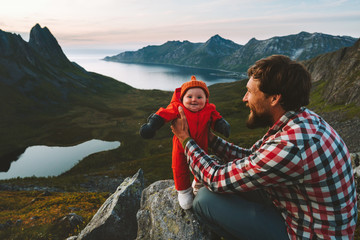 Father hiking with infant baby travel family healthy lifestyle adventure vacations trip in...