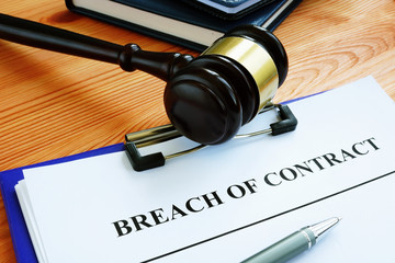 Breach of contract papers with pen and gavel. - obrazy, fototapety, plakaty