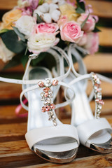 wedding shoes and bridal bouquet
