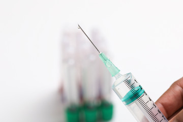 Doctor inject syringe of vaccine,used for vaccination,immunization and treatment COVID 19