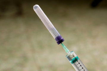Doctor inject syringe of vaccine,used for vaccination,immunization and treatment COVID 19