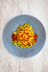 Pasta with Shrimps Dinner Dish on a the table