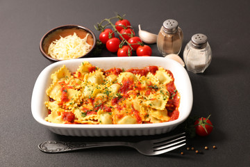 ravioli with tomato sauce and gruyere