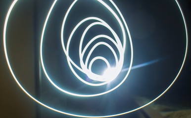 abstract spiral light on black background
