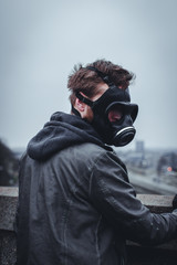 Man in mask / gas mask in the city