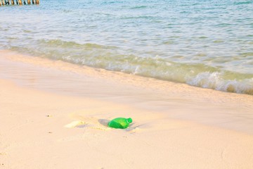 Fototapeta na wymiar Garbage along the coast of Koh rong Island Soksan Beach in Cambodia that shows ocean pollution, environmental damage and human waste