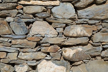 Old stone wall texture rough edges