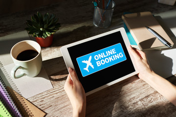 Flight ticket booking online service on device screen. Internet and technology concept.