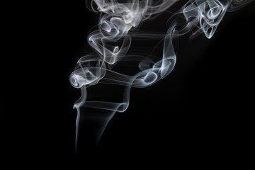 swirls of smoke on a black background