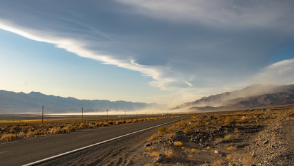 Fototapeta premium Sunset and sandstone on a road, california