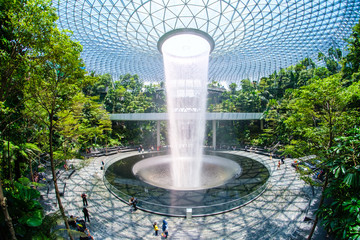 a look in the terminal of the Jewel Changi airport, the big fountain, shooting on a lens a fish eye - obrazy, fototapety, plakaty