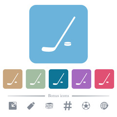 Hockey stick and puck flat icons on color rounded square backgrounds
