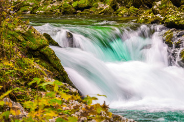 Fototapeta na wymiar Picturesque bubbling waterfalls