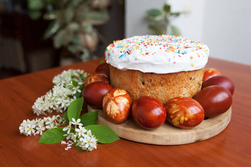 Easter symbols food - Easter cake and painted eggs. Easter orthodox sweet bread, kulich and...
