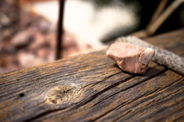 Stone on a piece of wood