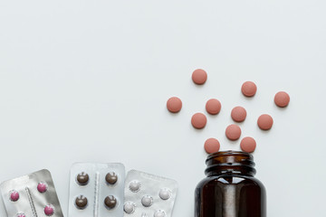 Vitamins and pills blister packs, close-up.