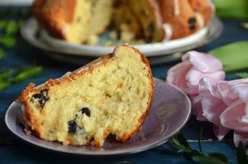 A piece of easter yeast cake on rustic saucer