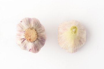 Obraz na płótnie Canvas Isolated garlic. Raw garlic isolated on white background