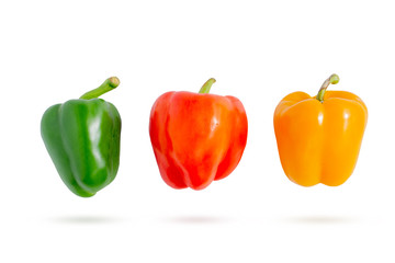 Colorful fresh vegetables three sweet  bell peppers isolated on white background